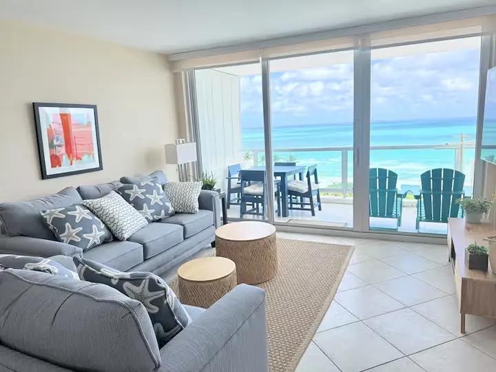 Ocean-view living room and balcony in Miami Beach apartment 1117