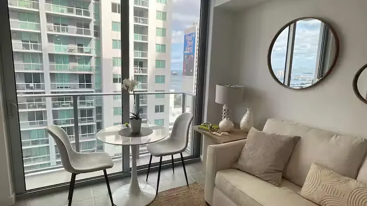 Living room and dining nook in Downtown Miami studio 2311